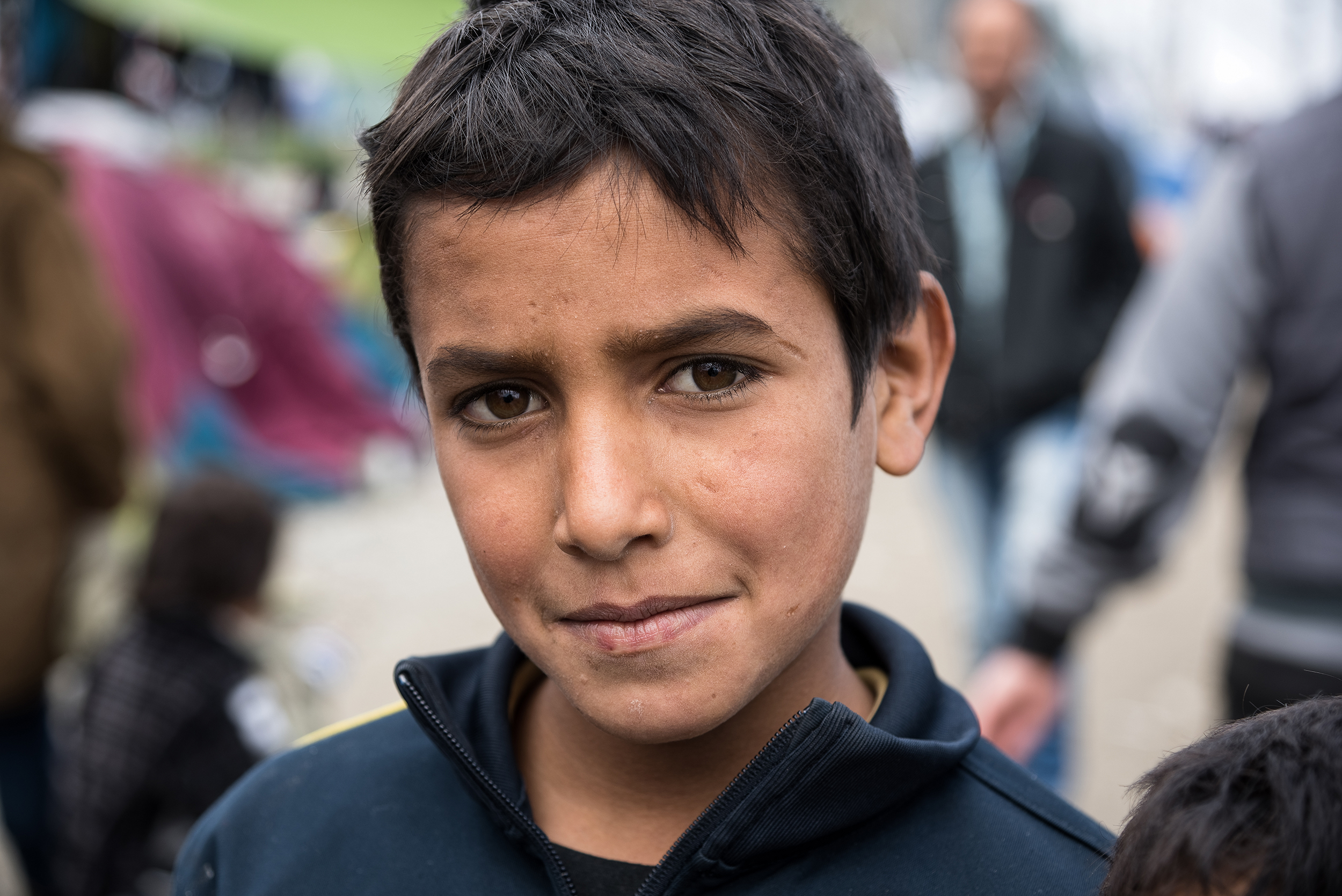 visage d'un jeune enfant réfugié accueilli en famille d'accueil